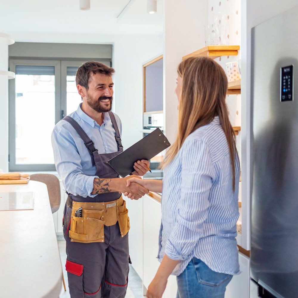 Handshake with Client — Milwaukee, WI — Reupert Plumbing