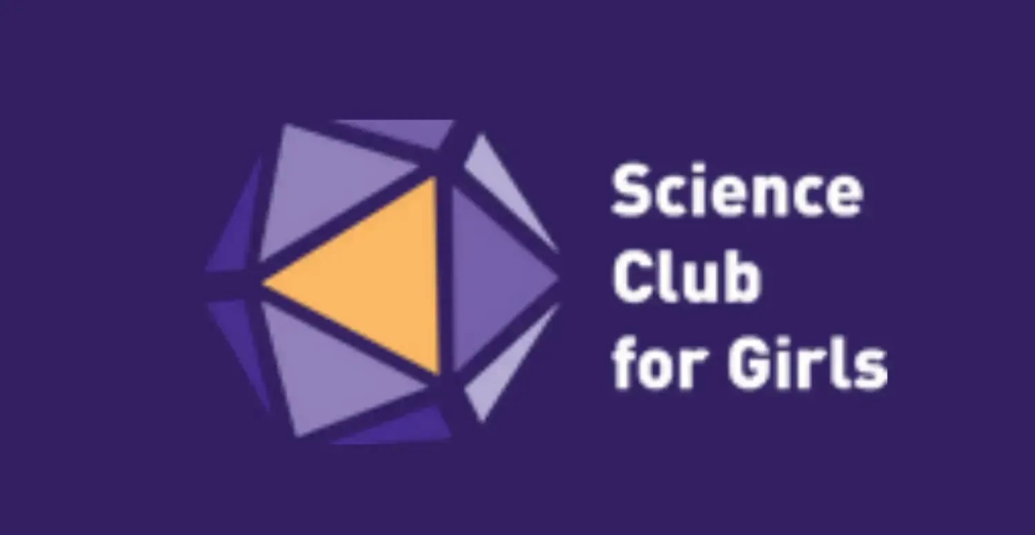 Logo for Science Club for Girls featuring a geometric, multifaceted purple shape with a single orange triangle segment.
