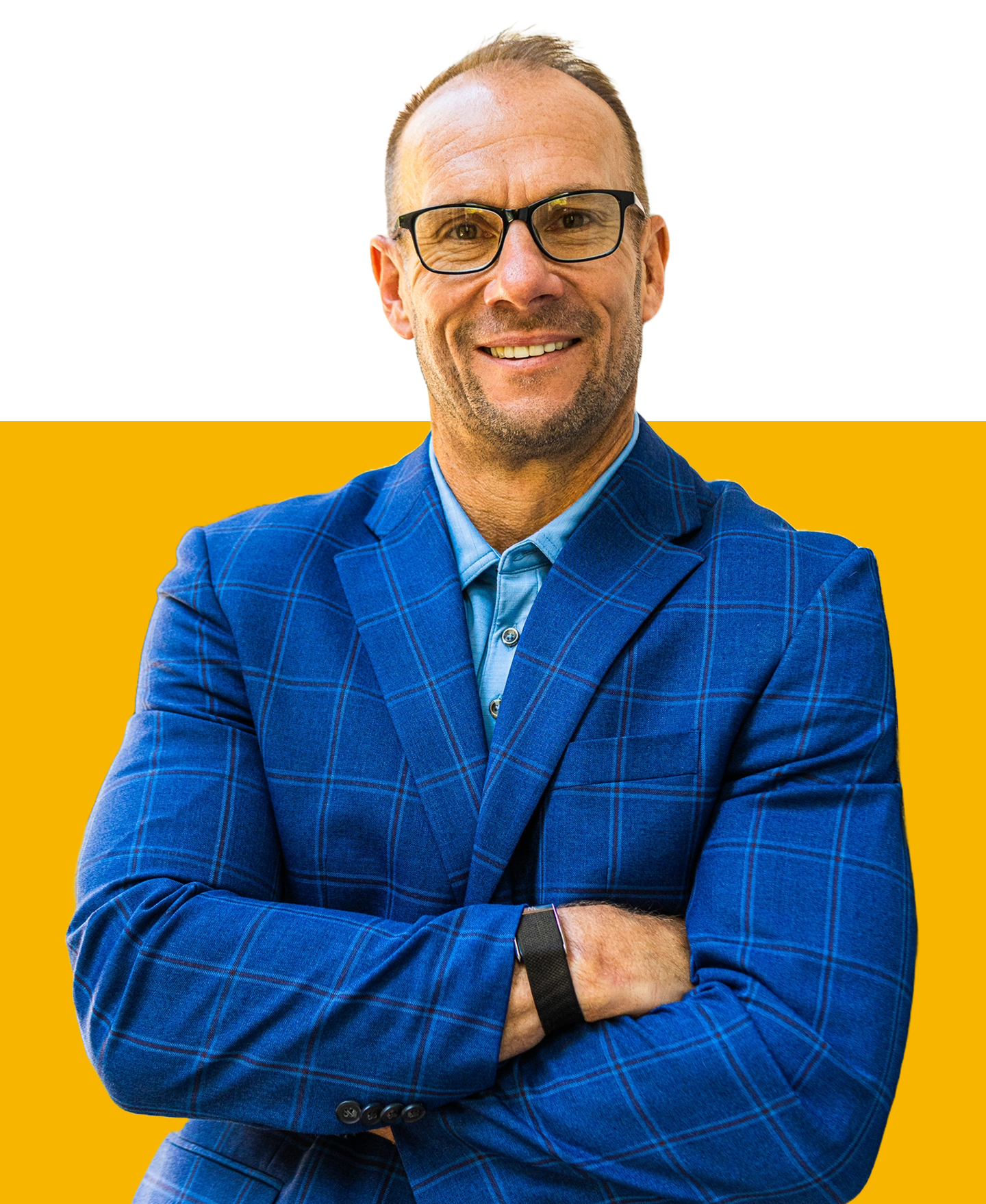 A smiling professional wearing glasses and a blue plaid blazer against a bright yellow background.