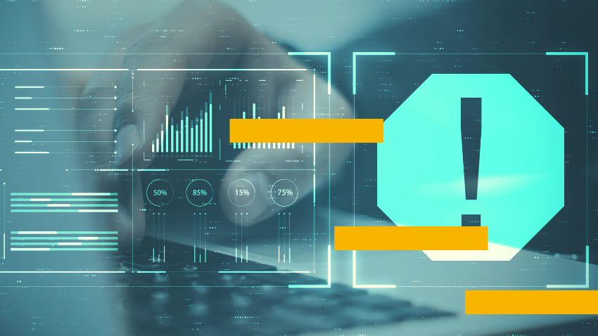 Person using laptop with digital data overlay and a warning sign.