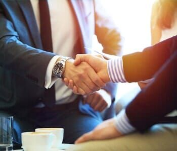 Attorney handshake with client — Attorney in Mchenry, IL