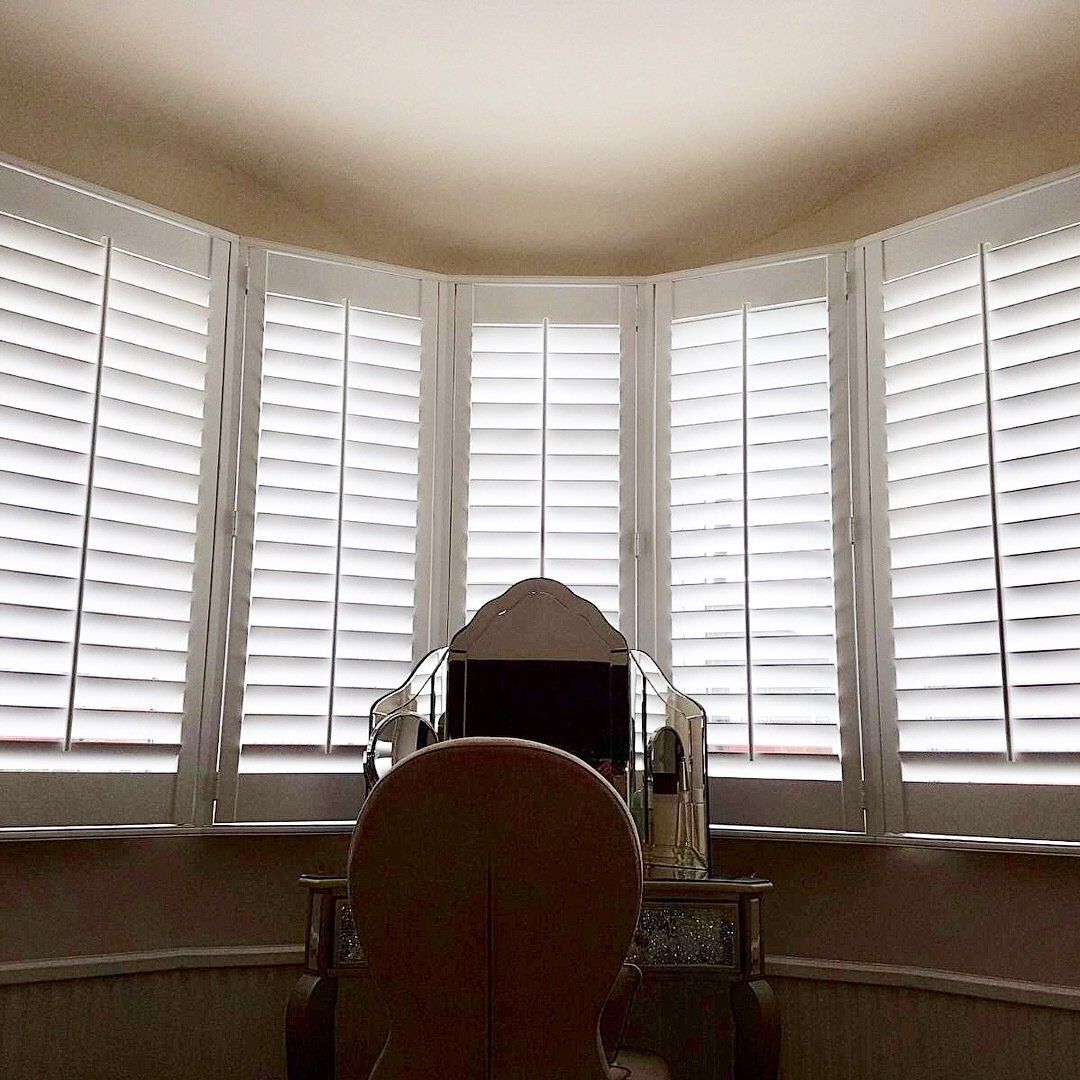 Bespoke shutters for unusual shaped windows