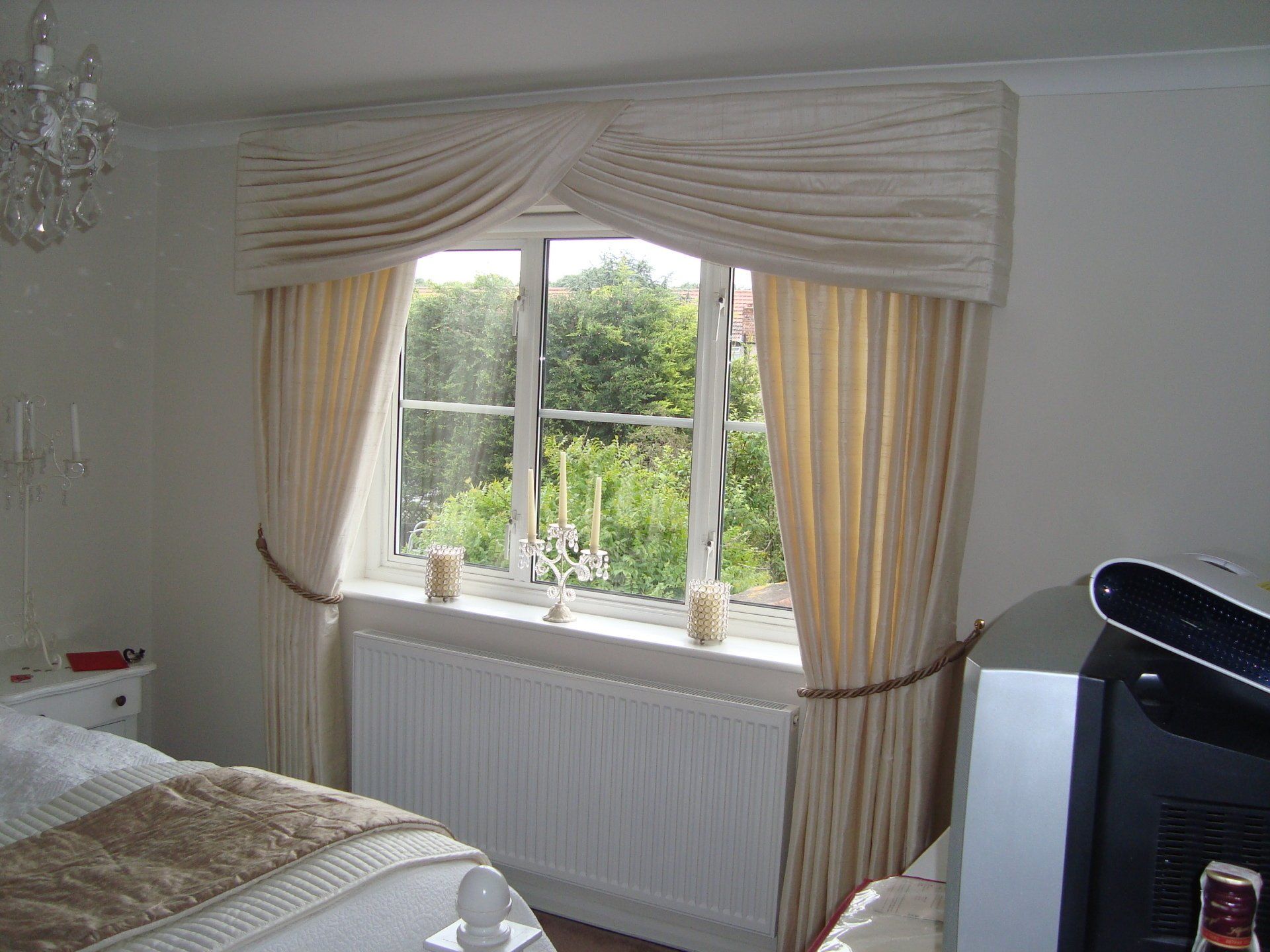Bespoke bedroom curtains including tie-backs