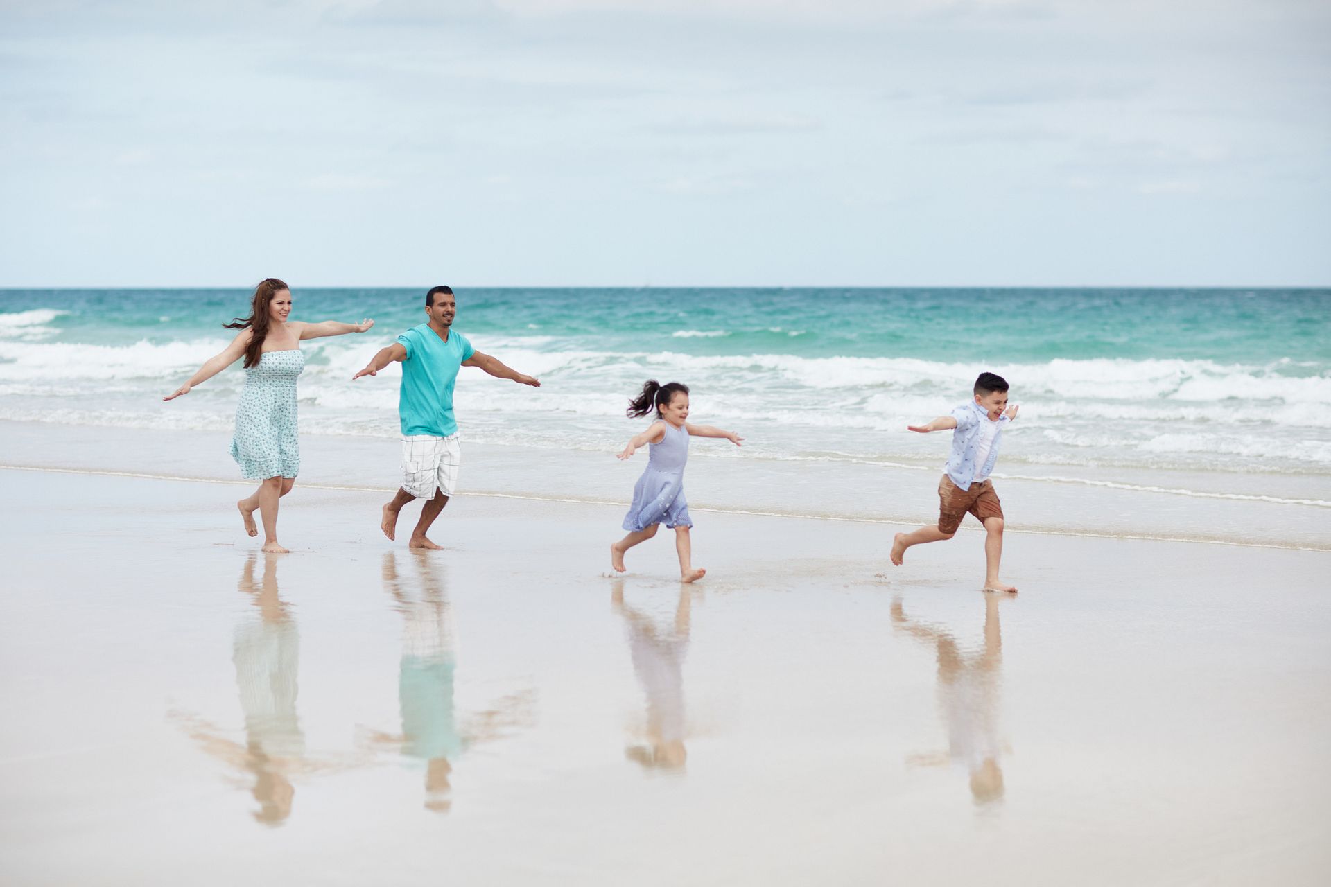 Picture of a family walking at the beach.