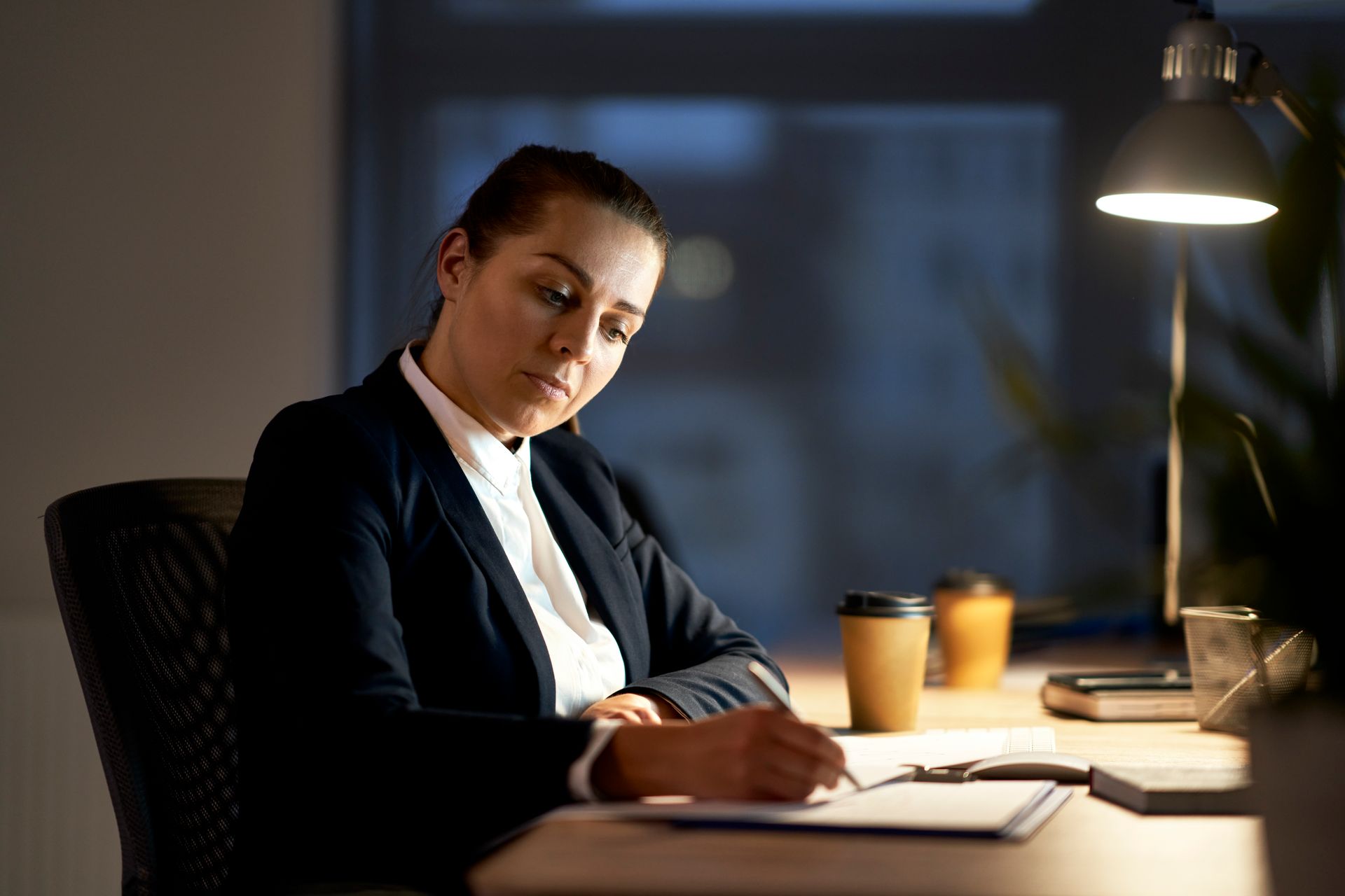 Ontario paralegal reviewing legal documents to build a strong defence for a traffic offence case