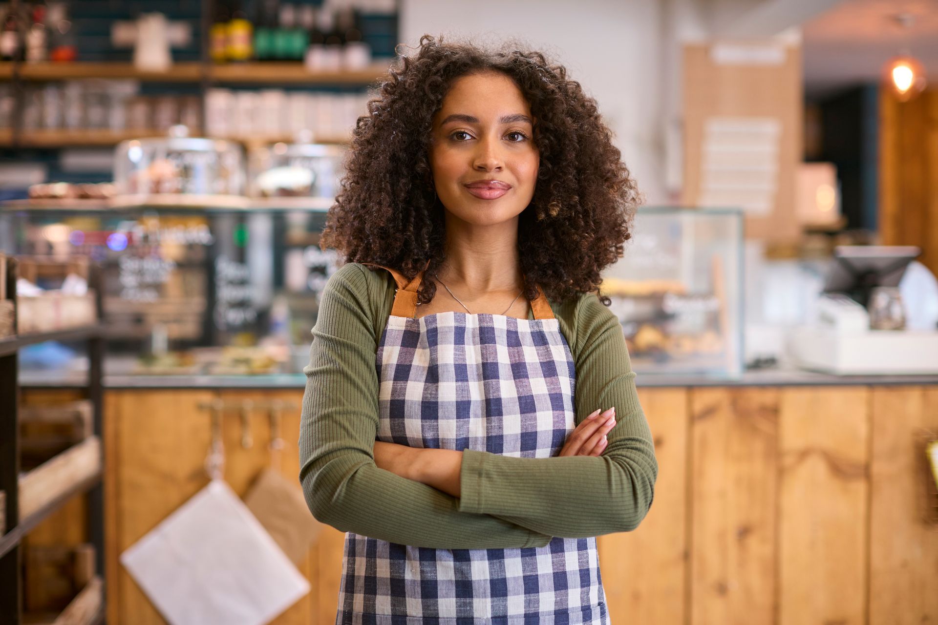 Confident small business owner in Ontario representing the type of clients who can start a Small Claims Court claim.
