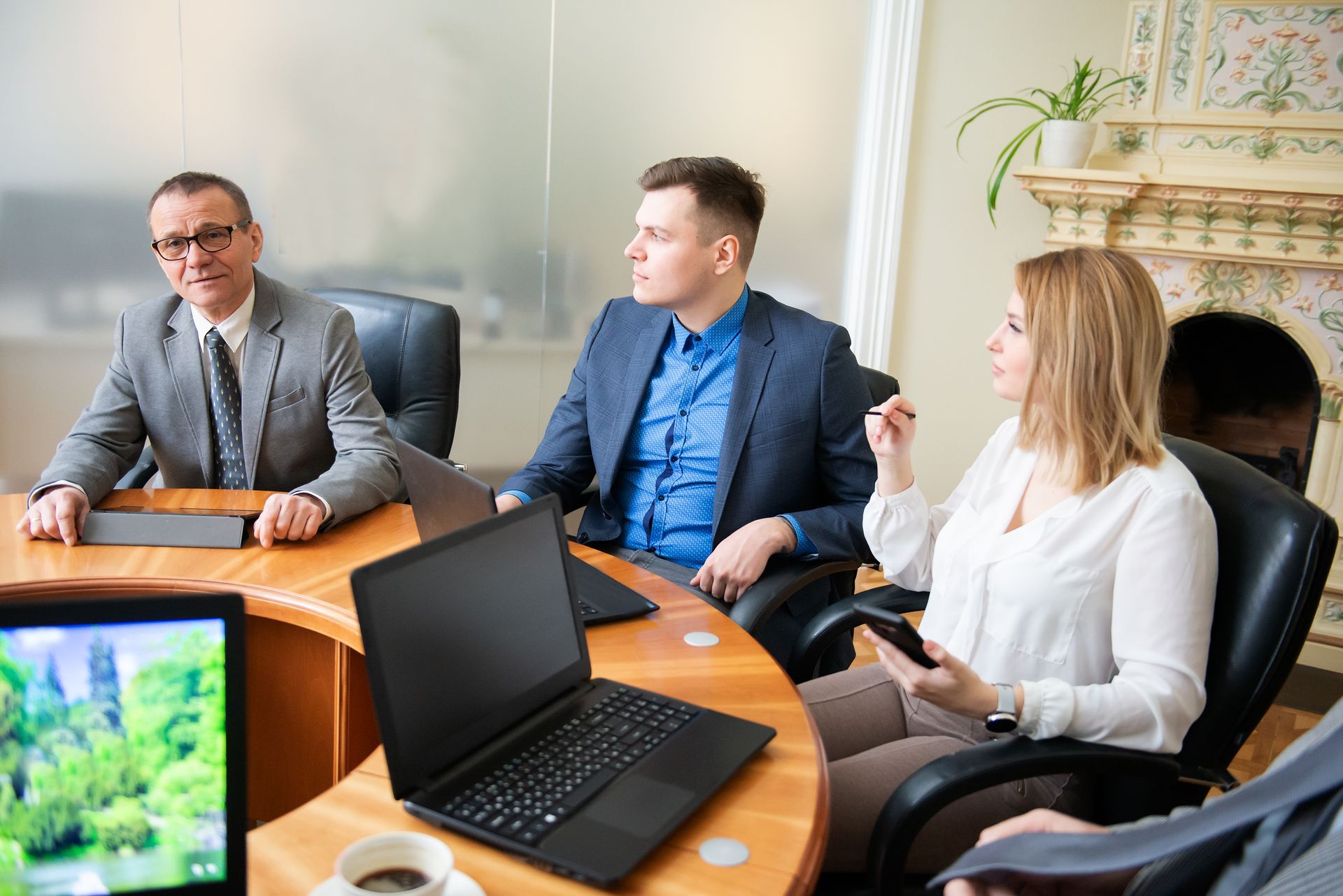 Ontario paralegal team meeting with clients to review Small Claims Court process and timelines.