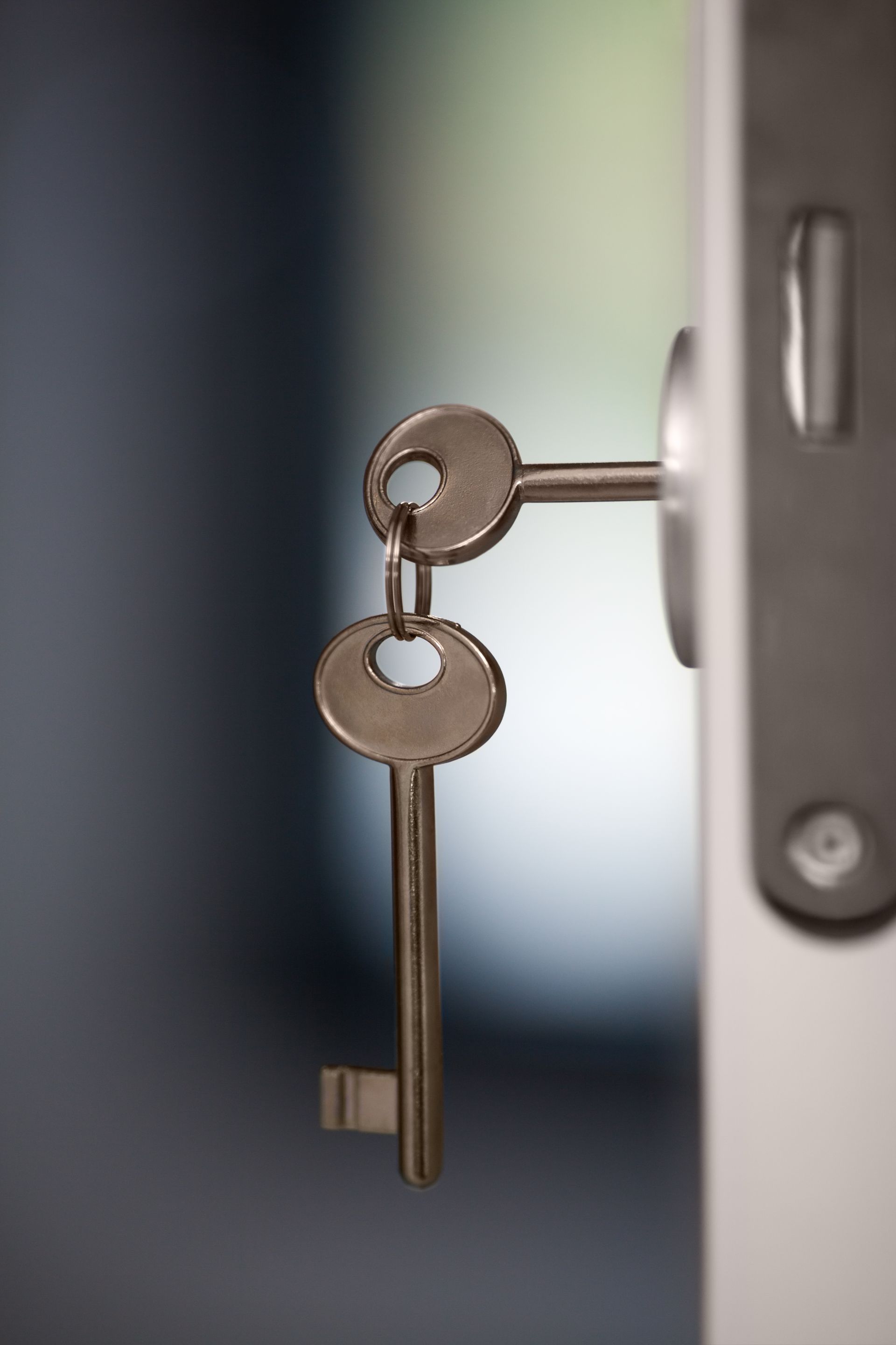 Key hanging in door — representing landlord and tenant legal services in Ontario