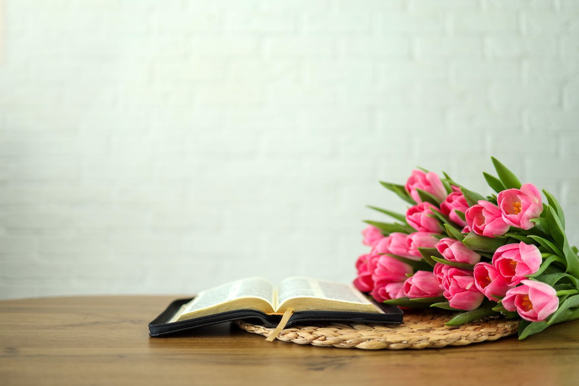flower bouquet on top of open book