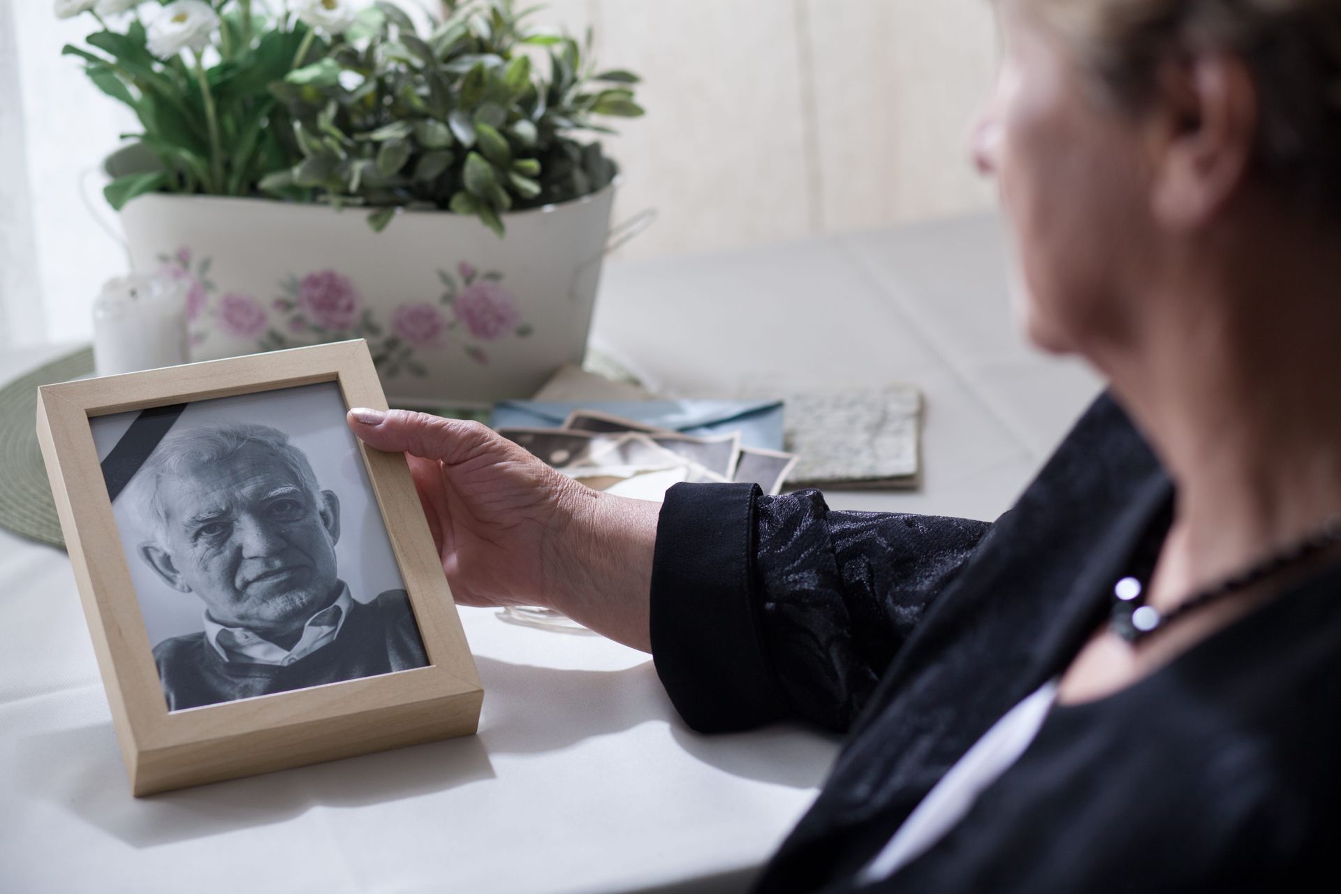 Widow looking at the photo