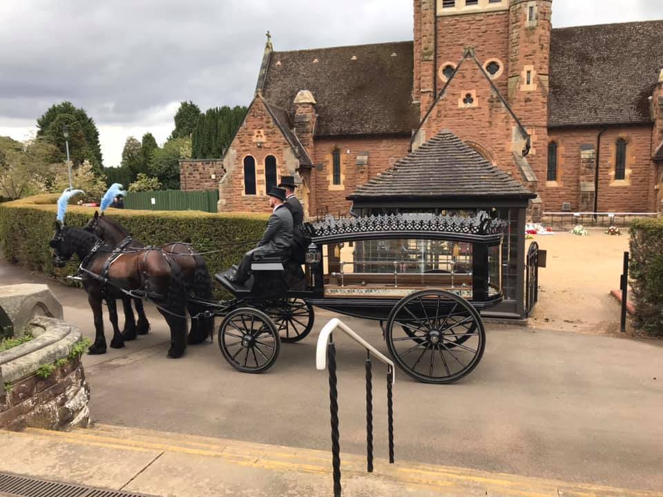 Black Horse-Drawn Hearse