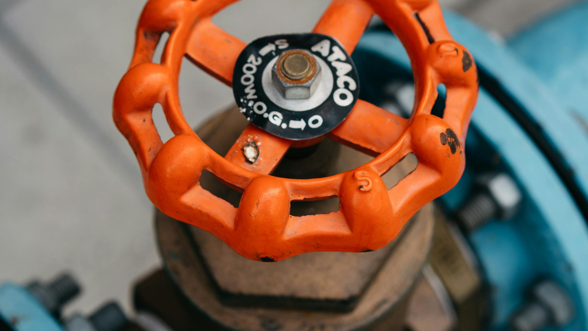 A row of metal pipes stacked on top of each other