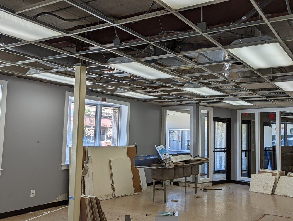 An empty room with a ceiling that is being remodeled.