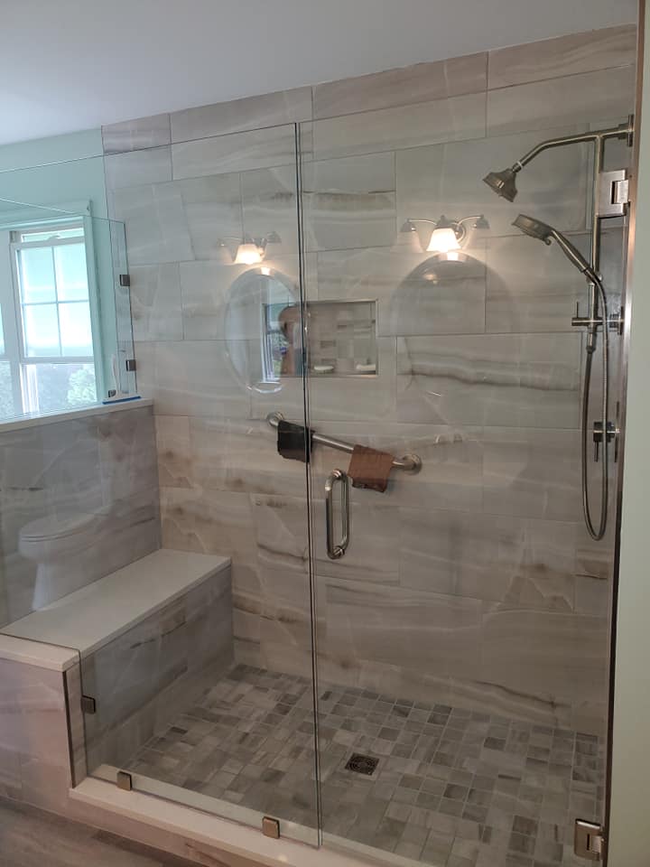 Walk in shower with seat and dual shower heads