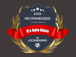 A shield with a red ribbon that says ' d 's auto glass ' on it