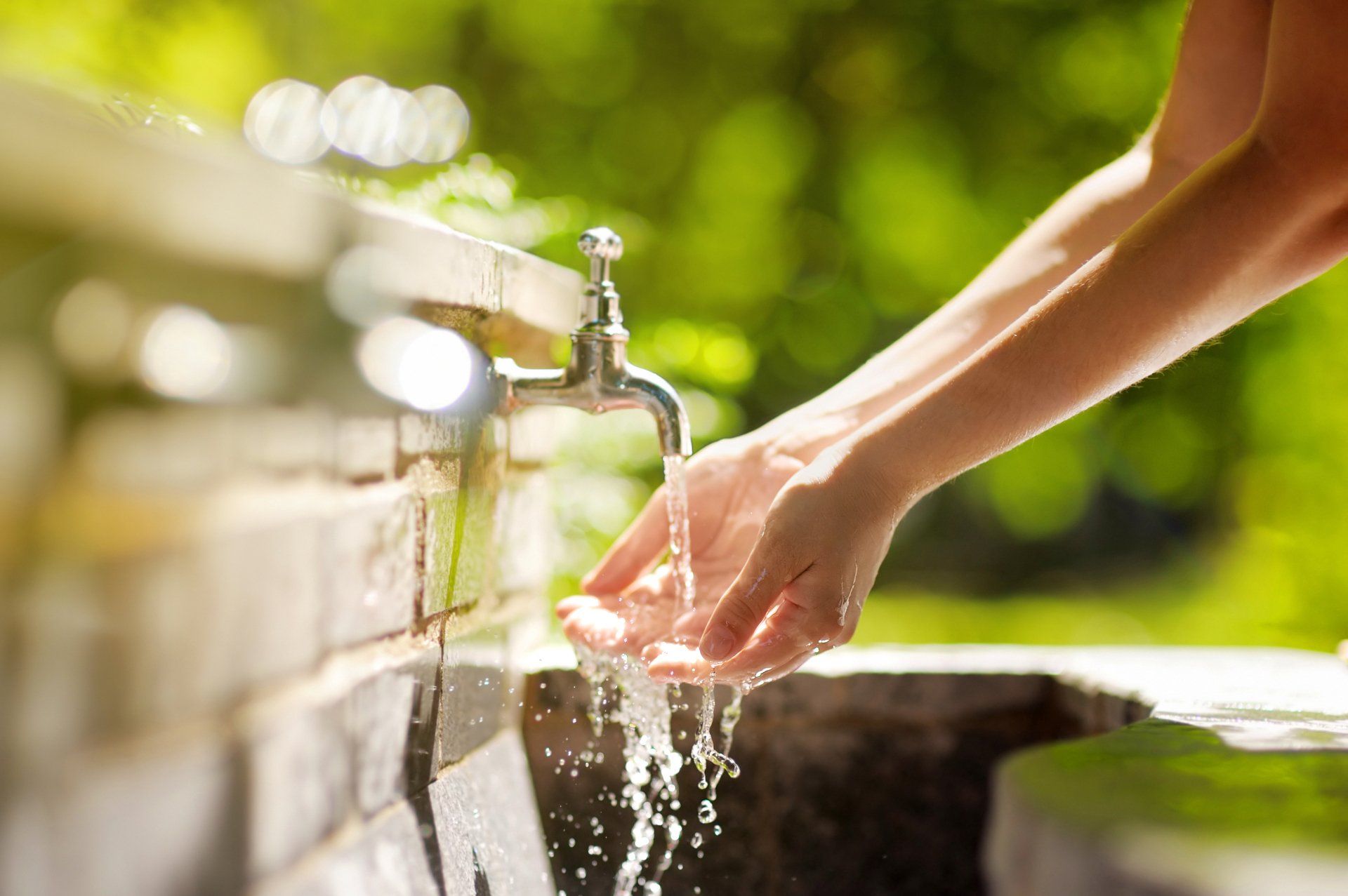 Woman Washing Hands — Fuquay-Varina, NC — A & E Water Conditioning