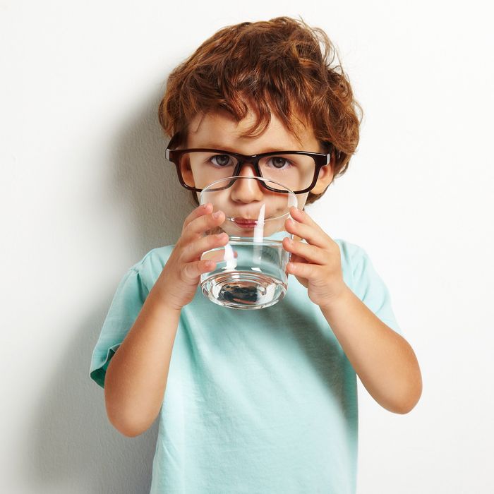 Kid Drinking Water — Fuquay-Varina, NC — A & E Water Conditioning