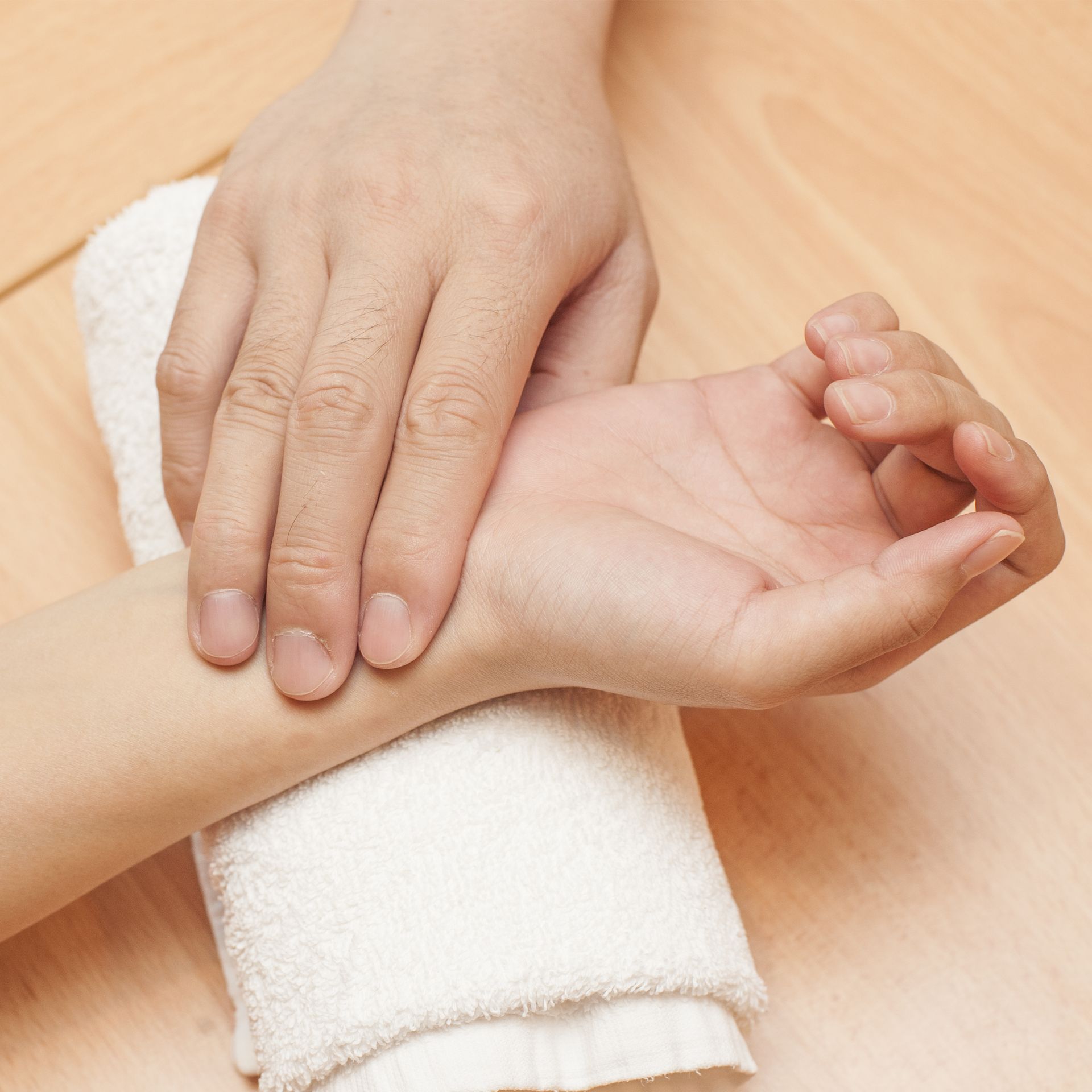 taking someones pulse at the wrist