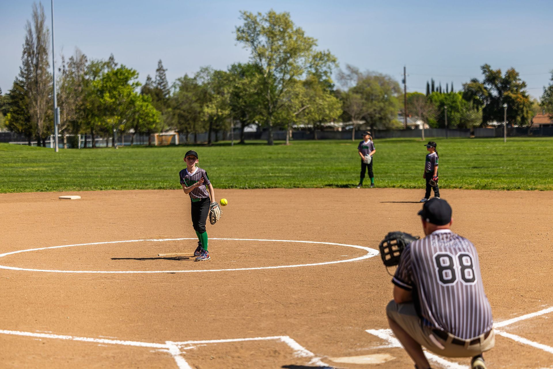 uniforms, action shot.