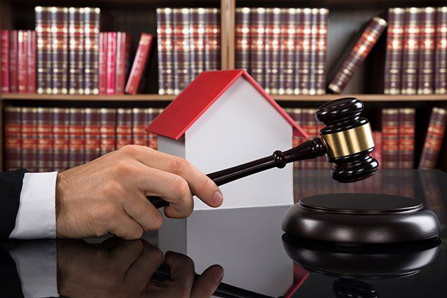 Estate Lawyer — Gavel with House Model in Zanesville, OH