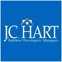The logo for jc hart builders developers and managers is blue and white.