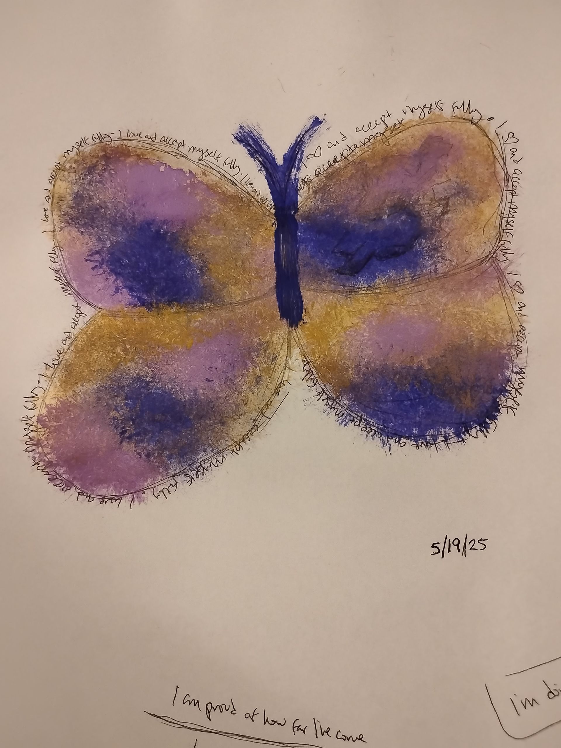 Butterfly artwork with purple, gold, and blue wings. Glitter outlines wings and body.