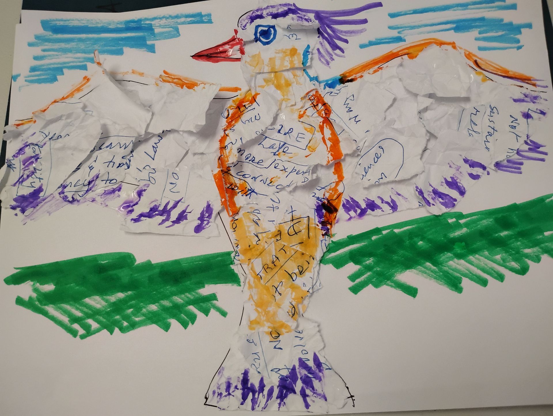 Colorful bird artwork made of paper and marker. White, orange, purple, green, and blue.