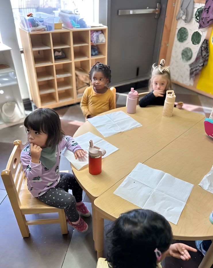 Montessori preschool children during snack time