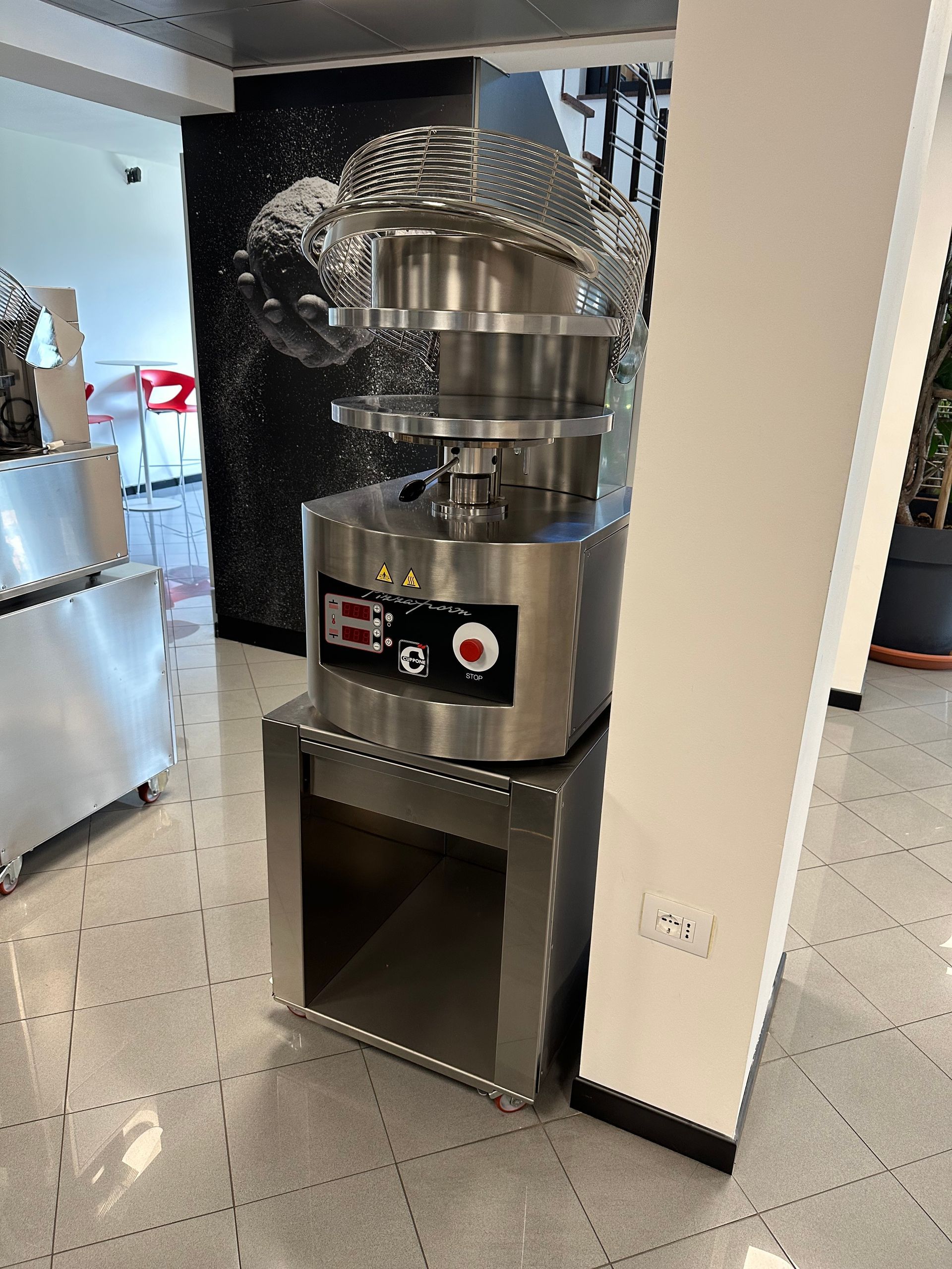 Cuppone Delta pizza oven in stainless steel for professional kitchens
Chef baking pizza in Cuppone Alpha oven with digital controls
Cuppone commercial pizza oven installed in modern pizzeria
Cuppone PizzaForm dough press machine preparing fresh pizza bases
Close-up of Cuppone HE400 pizza oven with energy-efficient design
Cuppone Italian pizza ovens showcased at Fine Food Sydney exhibition
