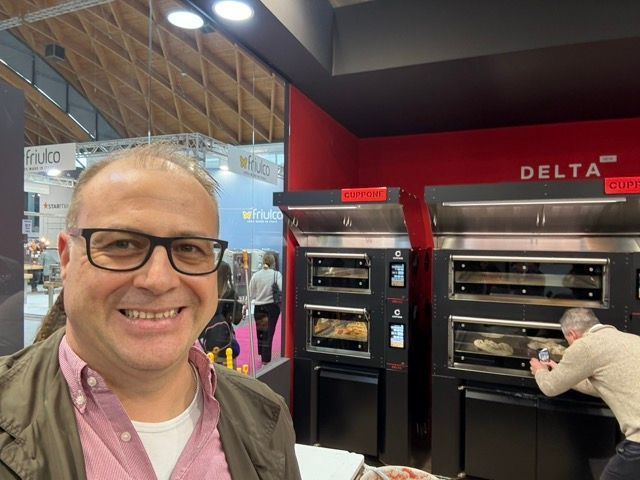 Cuppone Delta pizza oven in stainless steel for professional kitchens
Chef baking pizza in Cuppone Alpha oven with digital controls
Cuppone commercial pizza oven installed in modern pizzeria
Cuppone PizzaForm dough press machine preparing fresh pizza bases
Close-up of Cuppone HE400 pizza oven with energy-efficient design
Cuppone Italian pizza ovens showcased at Fine Food Sydney exhibition
