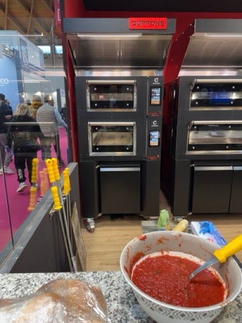 Cuppone Delta pizza oven in stainless steel for professional kitchens
Chef baking pizza in Cuppone Alpha oven with digital controls
Cuppone commercial pizza oven installed in modern pizzeria
Cuppone PizzaForm dough press machine preparing fresh pizza bases
Close-up of Cuppone HE400 pizza oven with energy-efficient design
Cuppone Italian pizza ovens showcased at Fine Food Sydney exhibition
