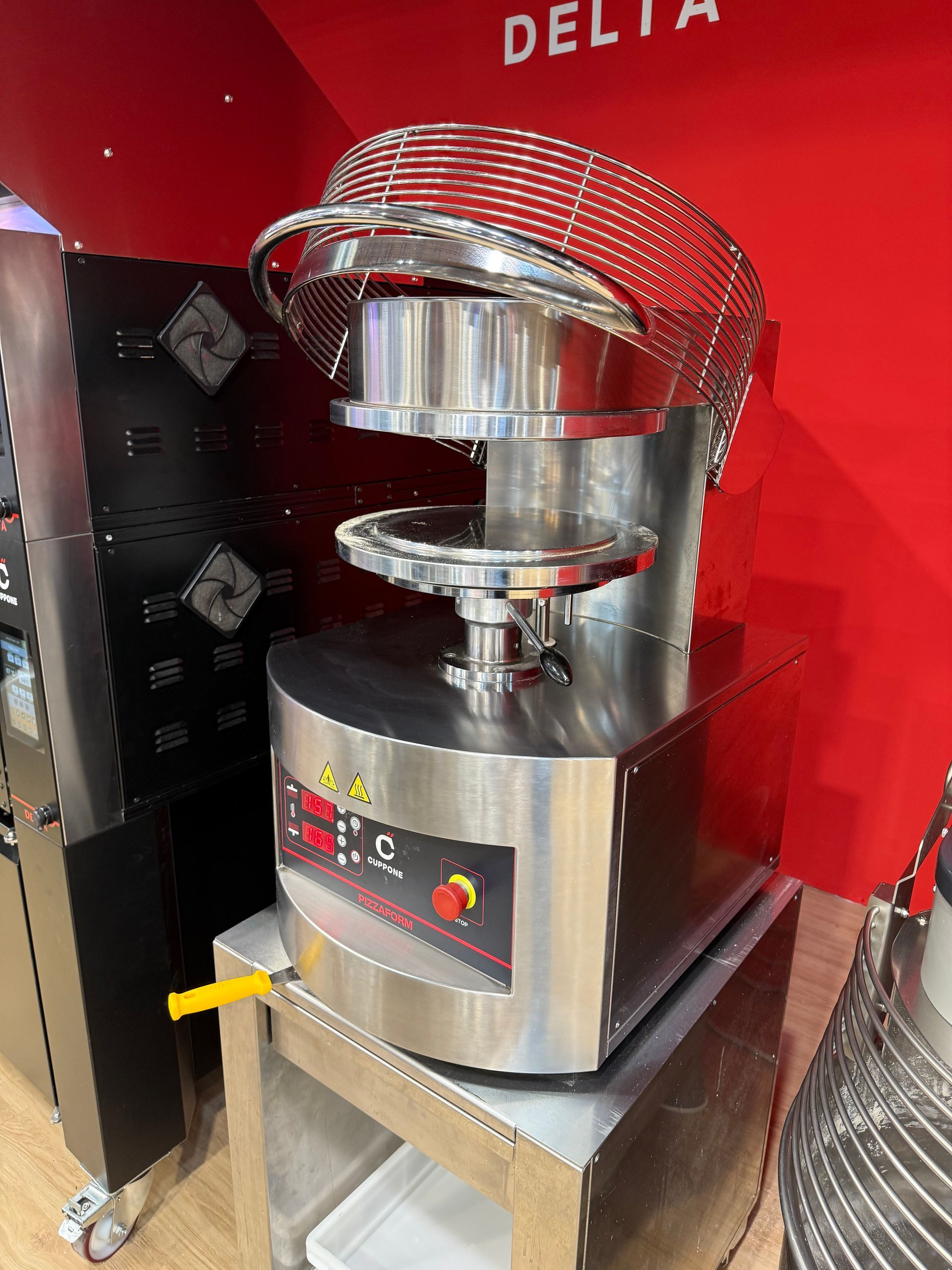 Cuppone Delta pizza oven in stainless steel for professional kitchens
Chef baking pizza in Cuppone Alpha oven with digital controls
Cuppone commercial pizza oven installed in modern pizzeria
Cuppone PizzaForm dough press machine preparing fresh pizza bases
Close-up of Cuppone HE400 pizza oven with energy-efficient design
Cuppone Italian pizza ovens showcased at Fine Food Sydney exhibition