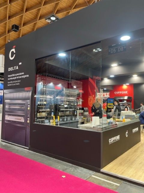 Cuppone Delta pizza oven in stainless steel for professional kitchens
Chef baking pizza in Cuppone Alpha oven with digital controls
Cuppone commercial pizza oven installed in modern pizzeria
Cuppone PizzaForm dough press machine preparing fresh pizza bases
Close-up of Cuppone HE400 pizza oven with energy-efficient design
Cuppone Italian pizza ovens showcased at Fine Food Sydney exhibition
