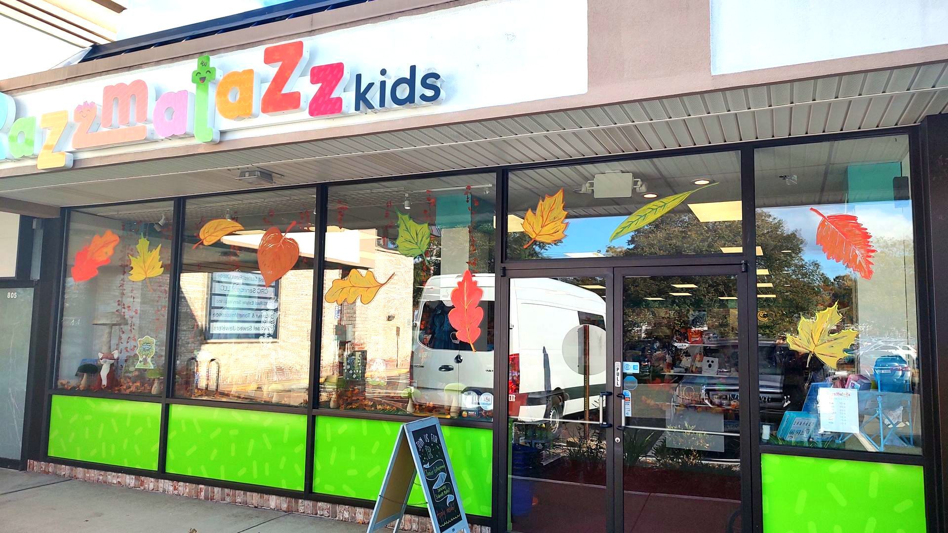 A store front with a sign that says jazz kids