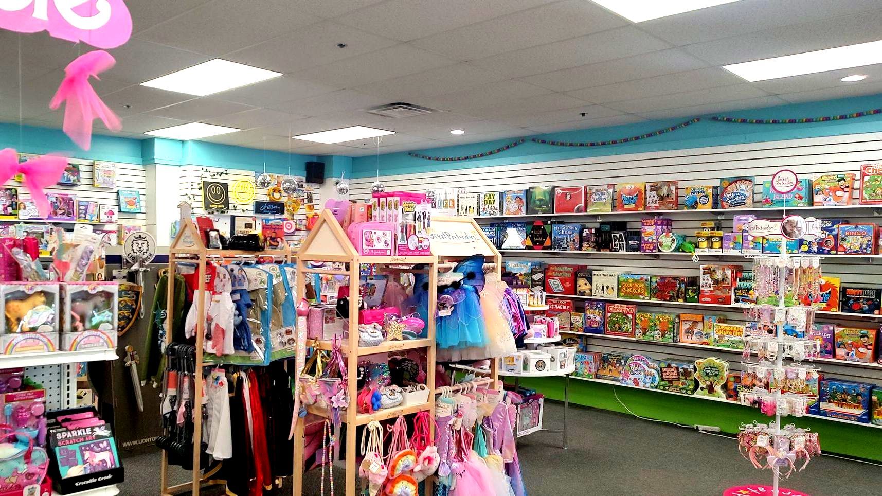 A toy store filled with lots of toys and clothes