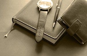 Bankruptcy Blog — Book, Watch, Pen, and Wallet in Chicago, IL