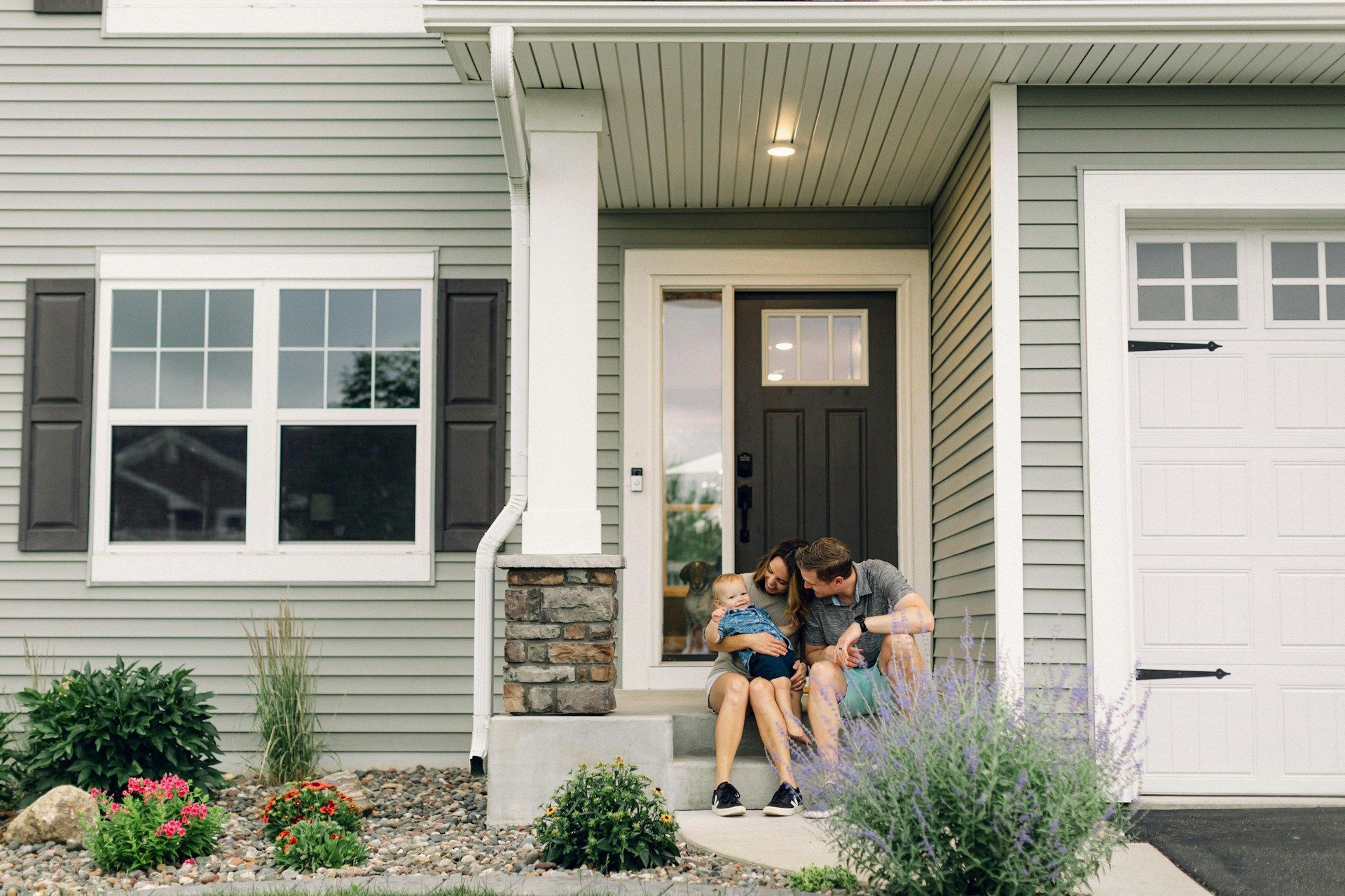 family outside their house