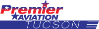 A blue and red logo for premier aviation tucson