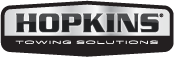 The logo for hopkins towing solutions is black and silver.
