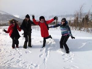 womens-group-jumping-in-the-snow