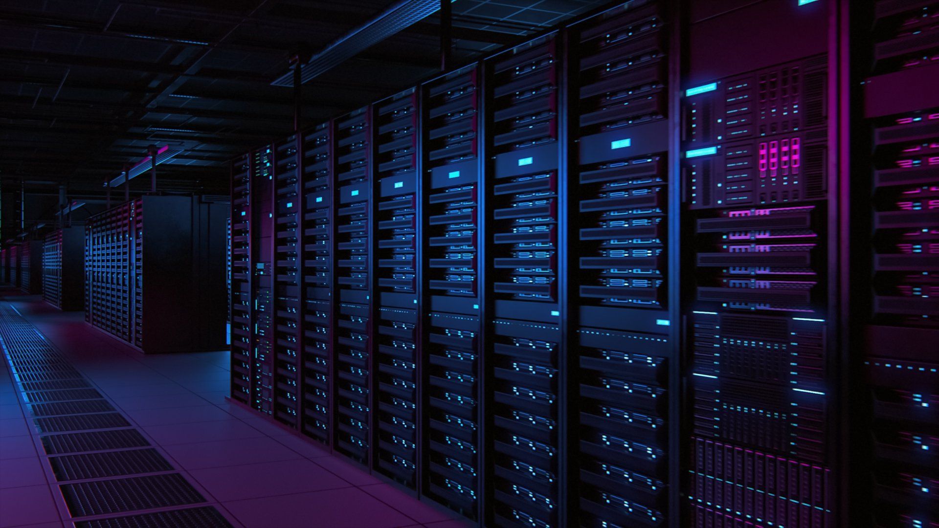 A row of servers in a data center at night.