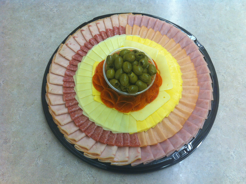 Deli Products Serving — Different Kinds of Ham and Cheese on plate top view in Orland Park, IL