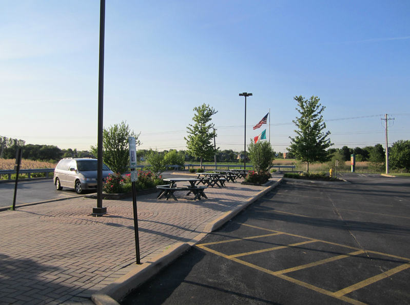 Italian Specialty Shop — Parking lot of the restaurant with tables in Orland Park, IL