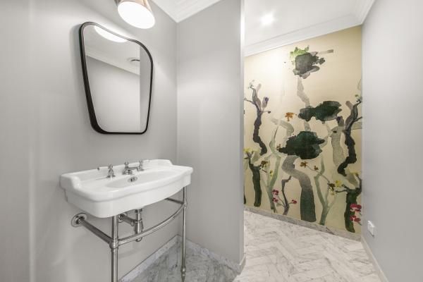 A Bathroom with A Sink a Mirror and A Painting on The Wall | Mid-North Coast, NSW | BDM Constructions