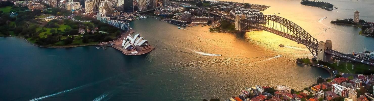 An Aerial View of Sydney Harbor and The Opera House at Sunset | Mid-North Coast, NSW | BDM Construct