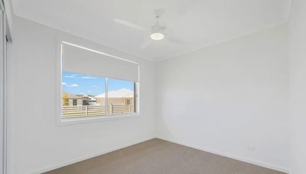 An Empty Room with A Window and A Ceiling Fan | Mid-North Coast, NSW | BDM Constructions