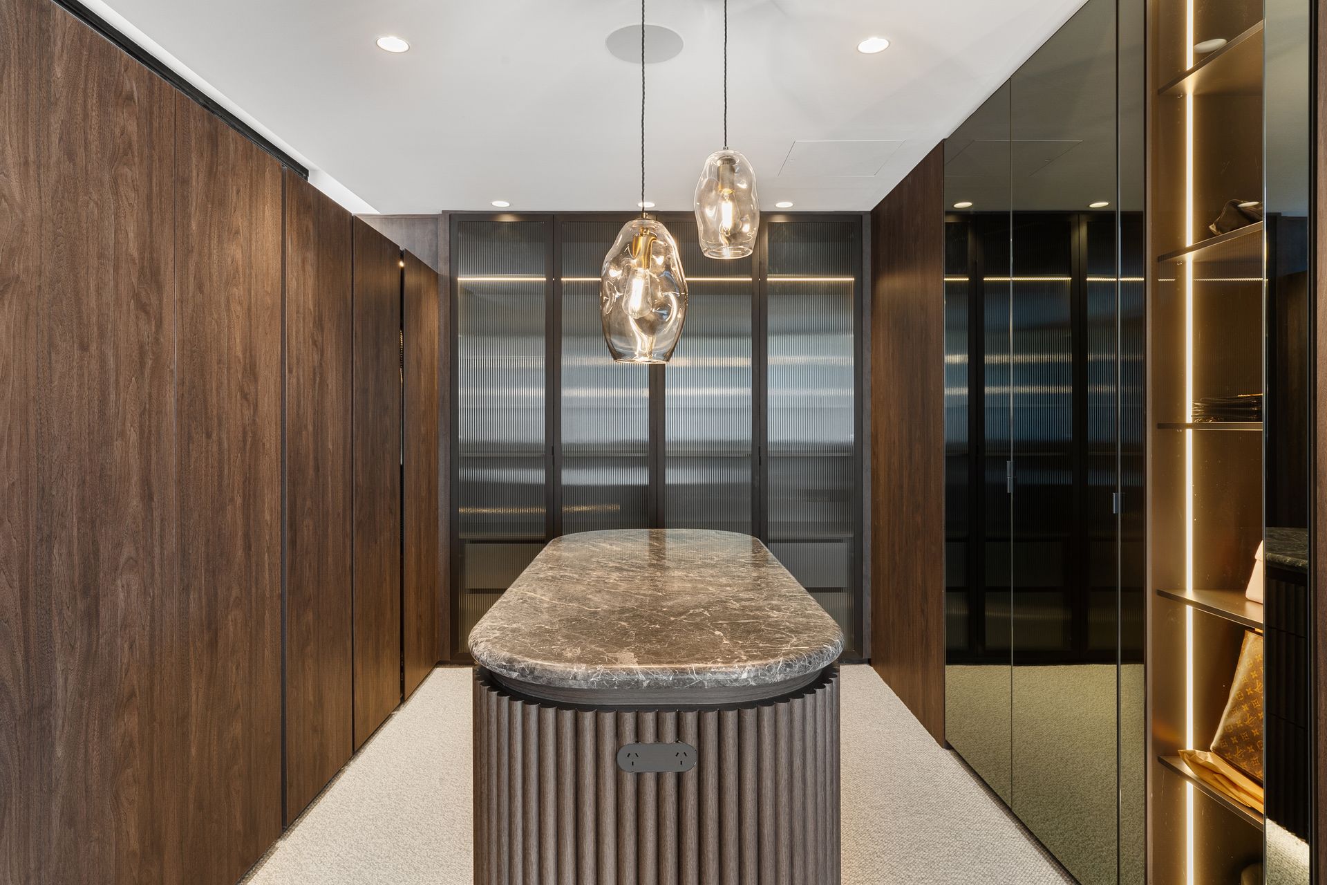 There is a large island in the middle of the room.