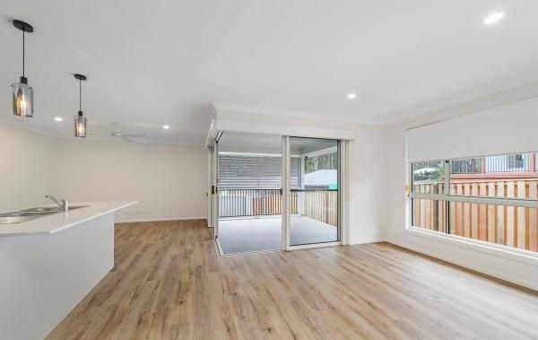 An Empty Living Room with Hardwood Floors | Mid-North Coast, NSW | BDM Constructions