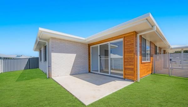 A Small House with A Lot of Windows and A Patio in The Backyard | Mid-North Coast, NSW | BDM Constructions