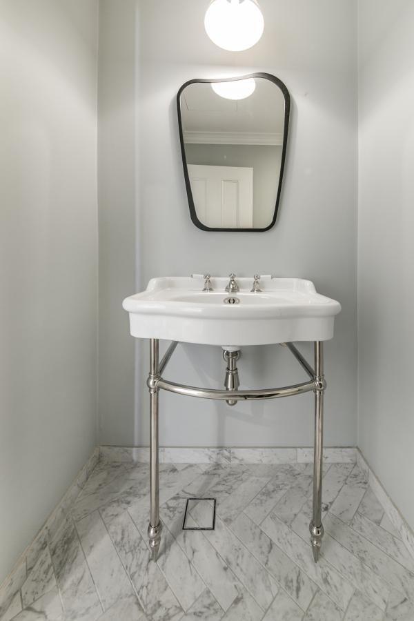 A Bathroom with A Sink , Mirror and Marble Floor | Mid-North Coast, NSW | BDM Constructions